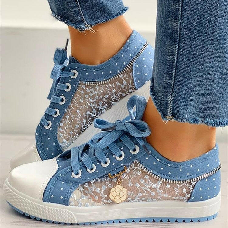 Large mesh student sports board shoes with hollowed out casual flat bottom lace up canvas shoes for women.