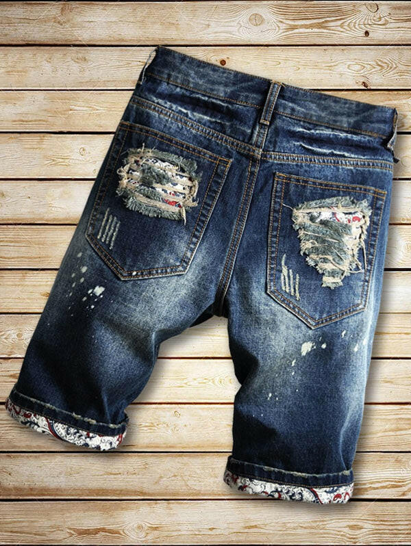 Destroyed Cuffed Faded Wash Denim Shorts..