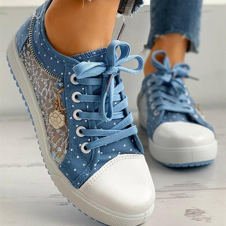 Large mesh student sports board shoes with hollowed out casual flat bottom lace up canvas shoes for women.