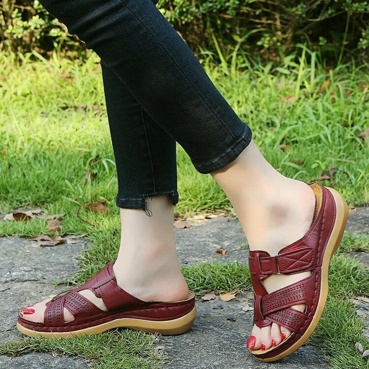 Sandals for women with thick soles and sloping heels, wearing beach sandals on the outside.