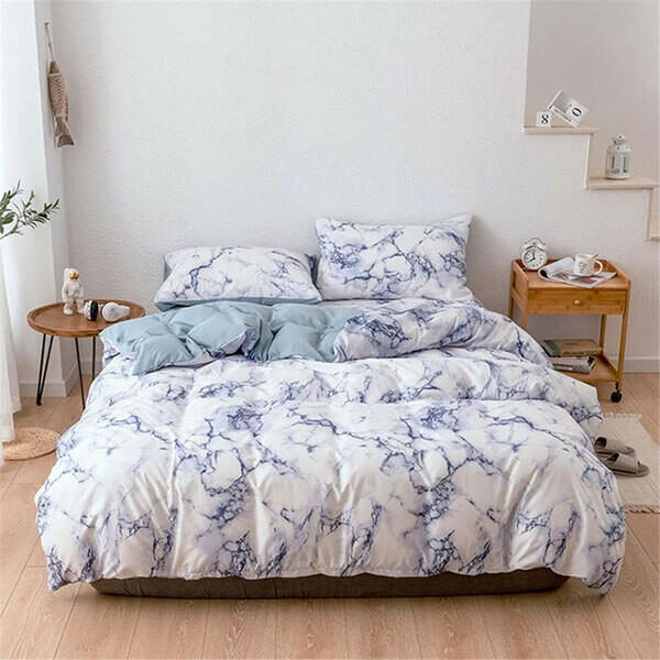 The Bedroom Bedding Is A Comfortable White Marble Pattern Printed Duvet Cover (2/3 Piece Set).