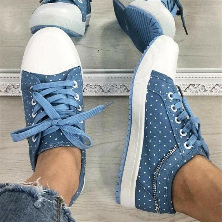 Large mesh student sports board shoes with hollowed out casual flat bottom lace up canvas shoes for women.